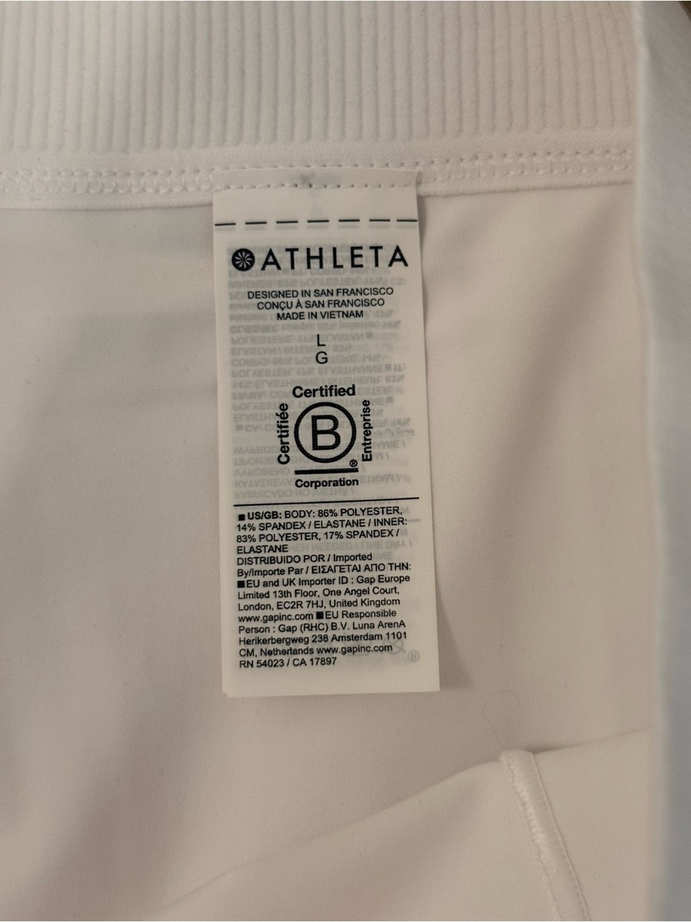 NWT Athleta Match Point Pleated Skirt with Built-In Shorts Size Large White - Picture 11 of 11